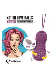 Фиолетовые вагинальные шарики с вращением бусин Remote Controlled Motion Love Balls Foxy